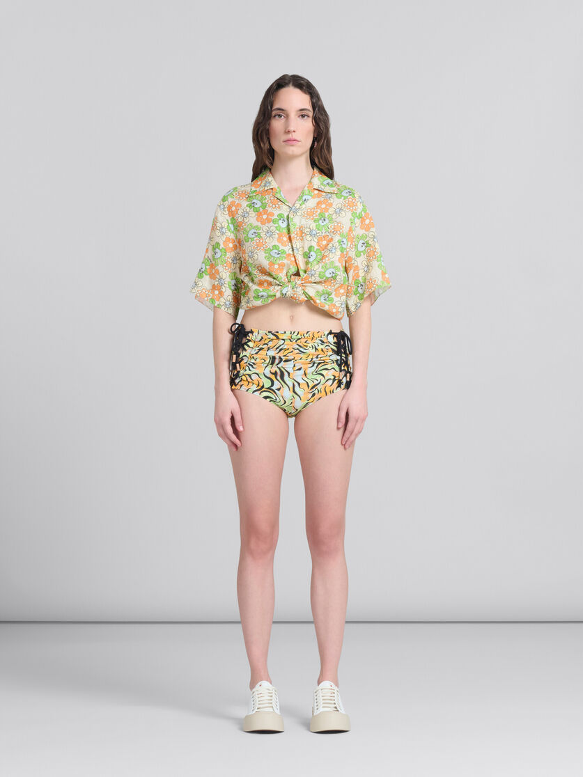 Culotte-Shorts aus Bio-Baumwolle mit Print in Orange und Grün - Hosen - Image 1