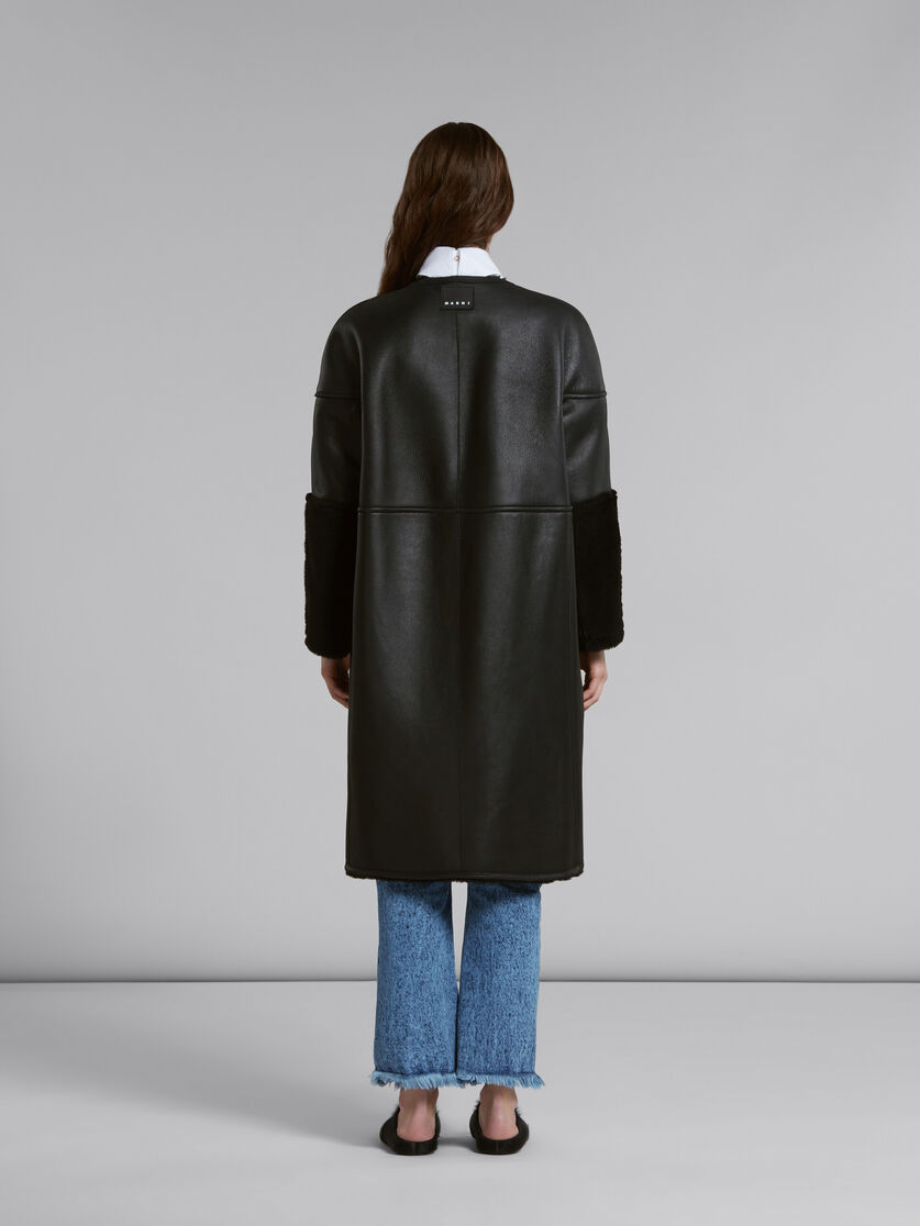 Black reversible shearling coat - Coats - Image 3