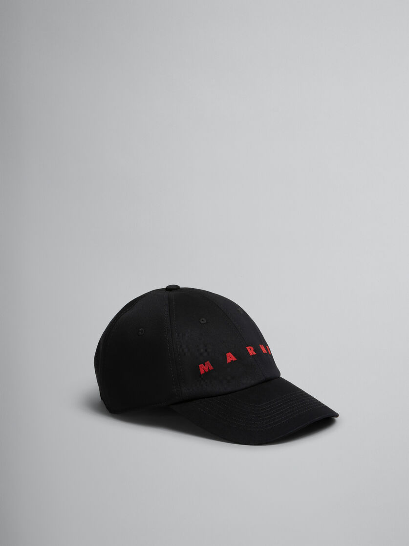 Schwarze Schirmmütze aus Bio-Gabardine mit Logo-Stickerei - Hüte - Image 1