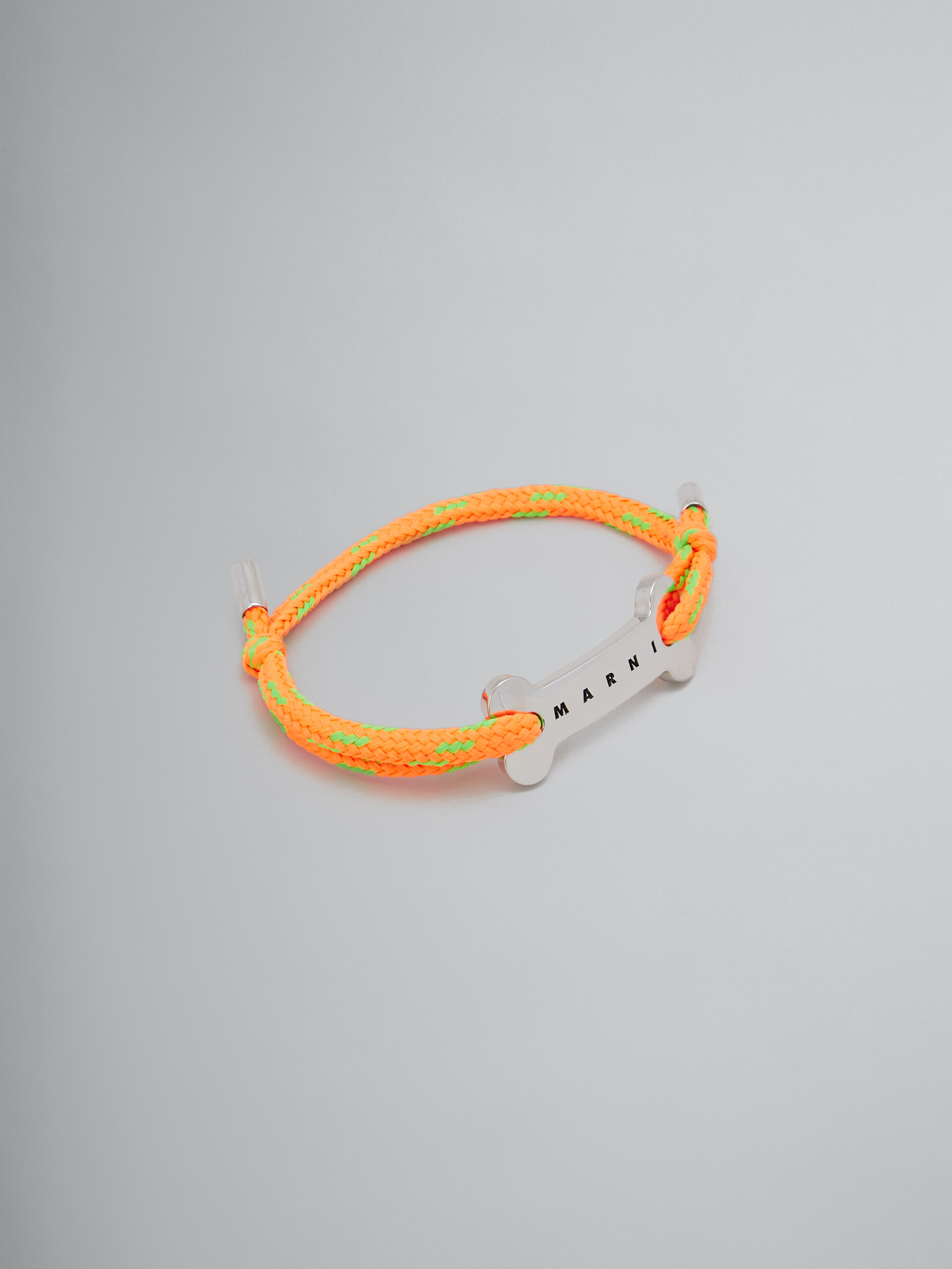 Bracelet en lacet bleu avec plaque en forme d’os - Bracelets - Image 1