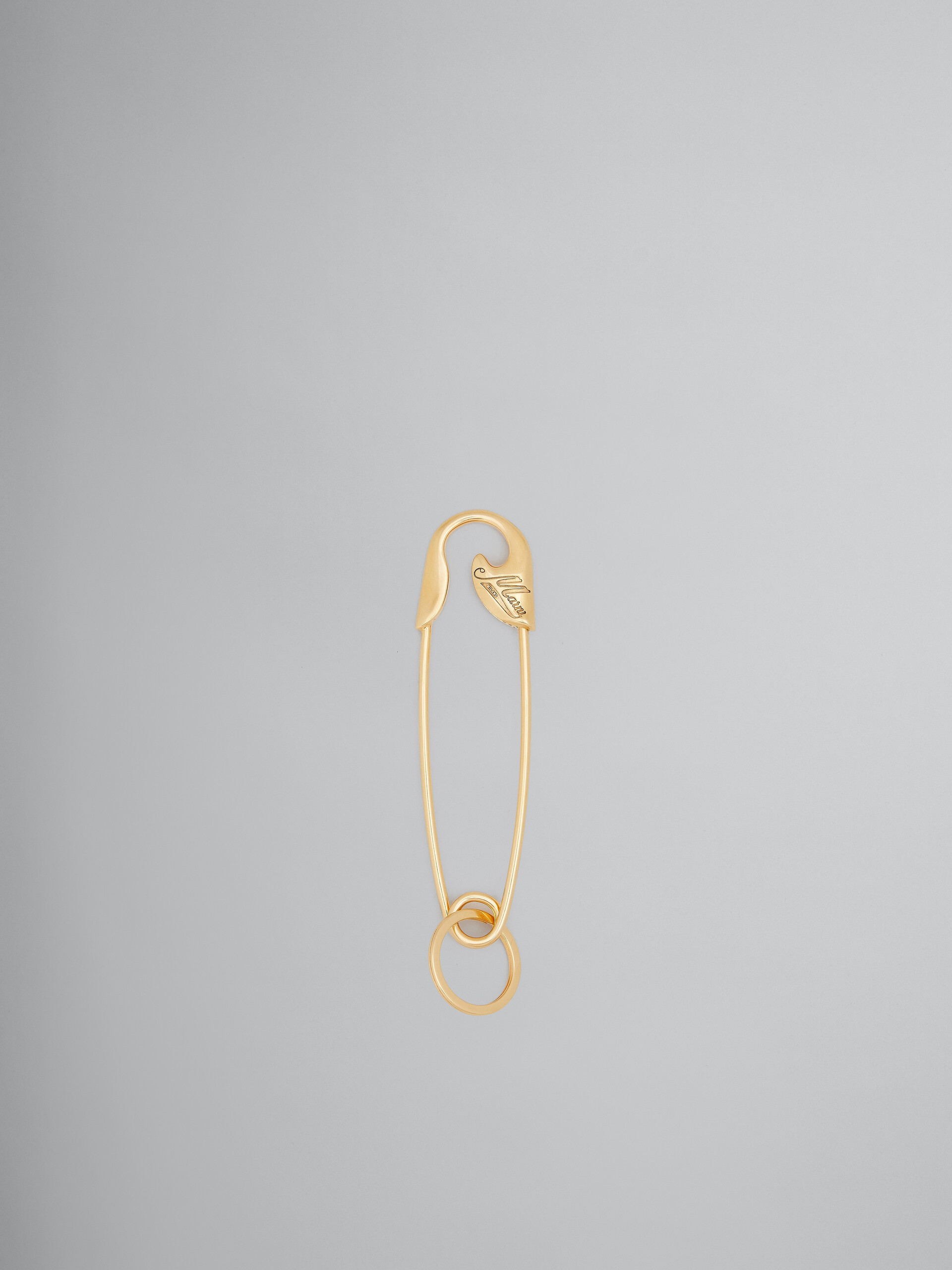 Llavero dorado con forma de imperdible - Joyas - Image 1