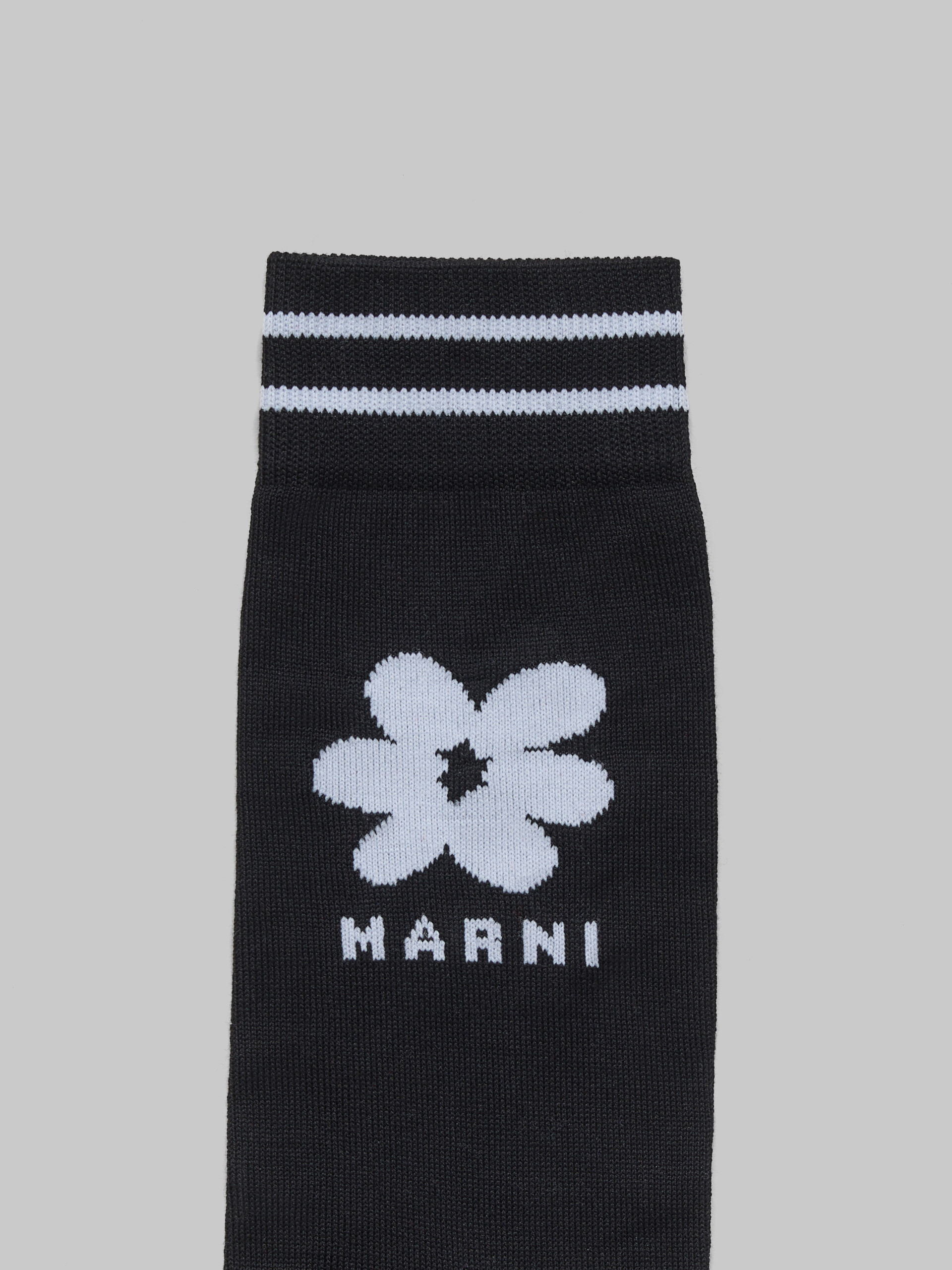 Black cotton socks with light blue jacquard flower detail - Socks - Image 3