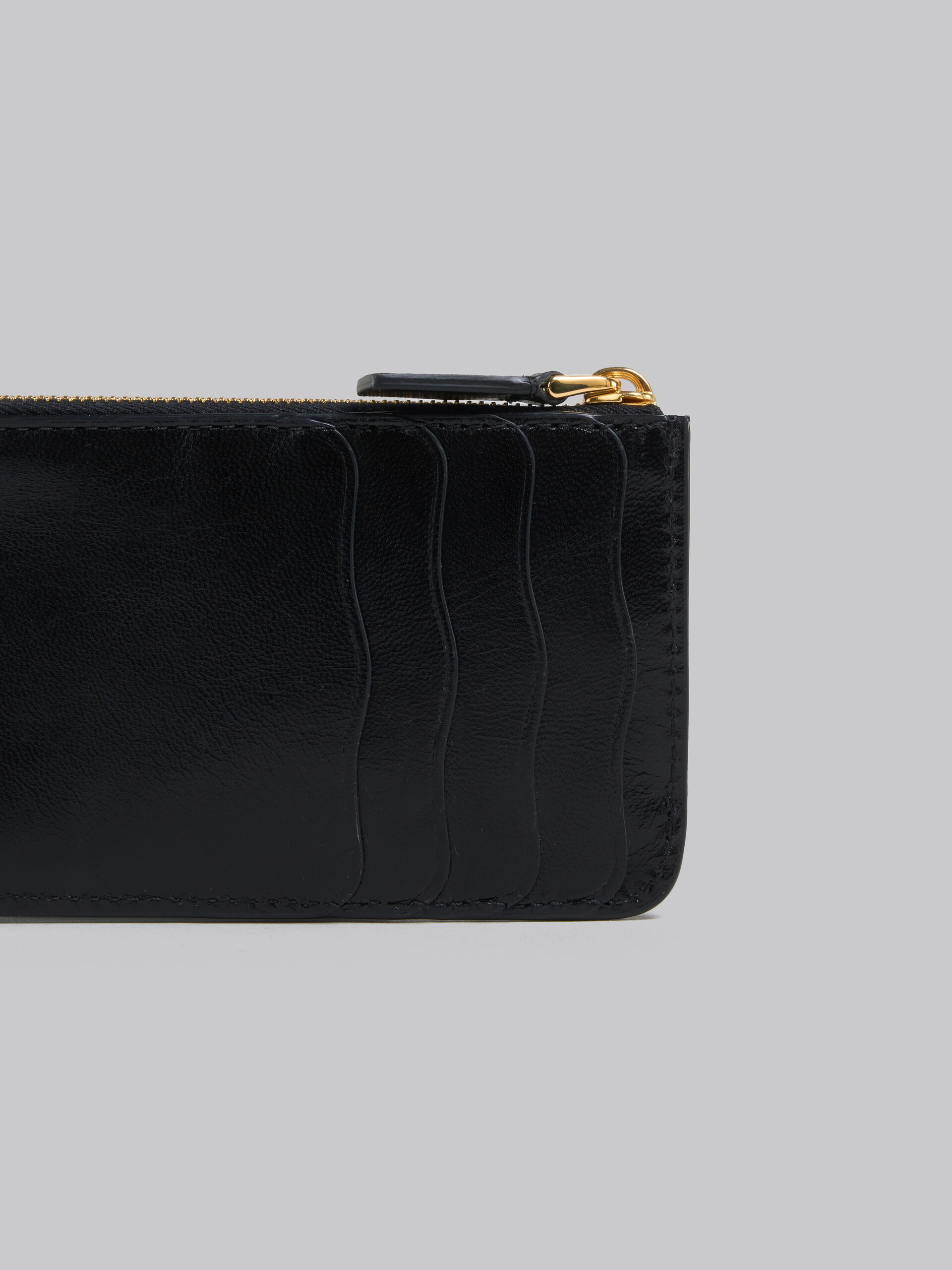 Schwarzes Lederportemonnaie mit wellenförmigen Fächern - Brieftaschen - Image 4