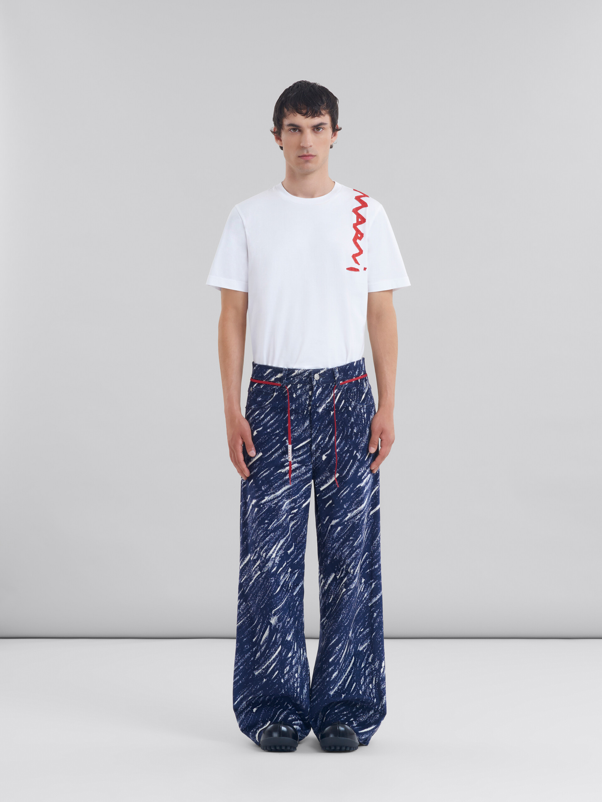 Blue flocked denim flared jeans with Crayon print - Pants - Image 2