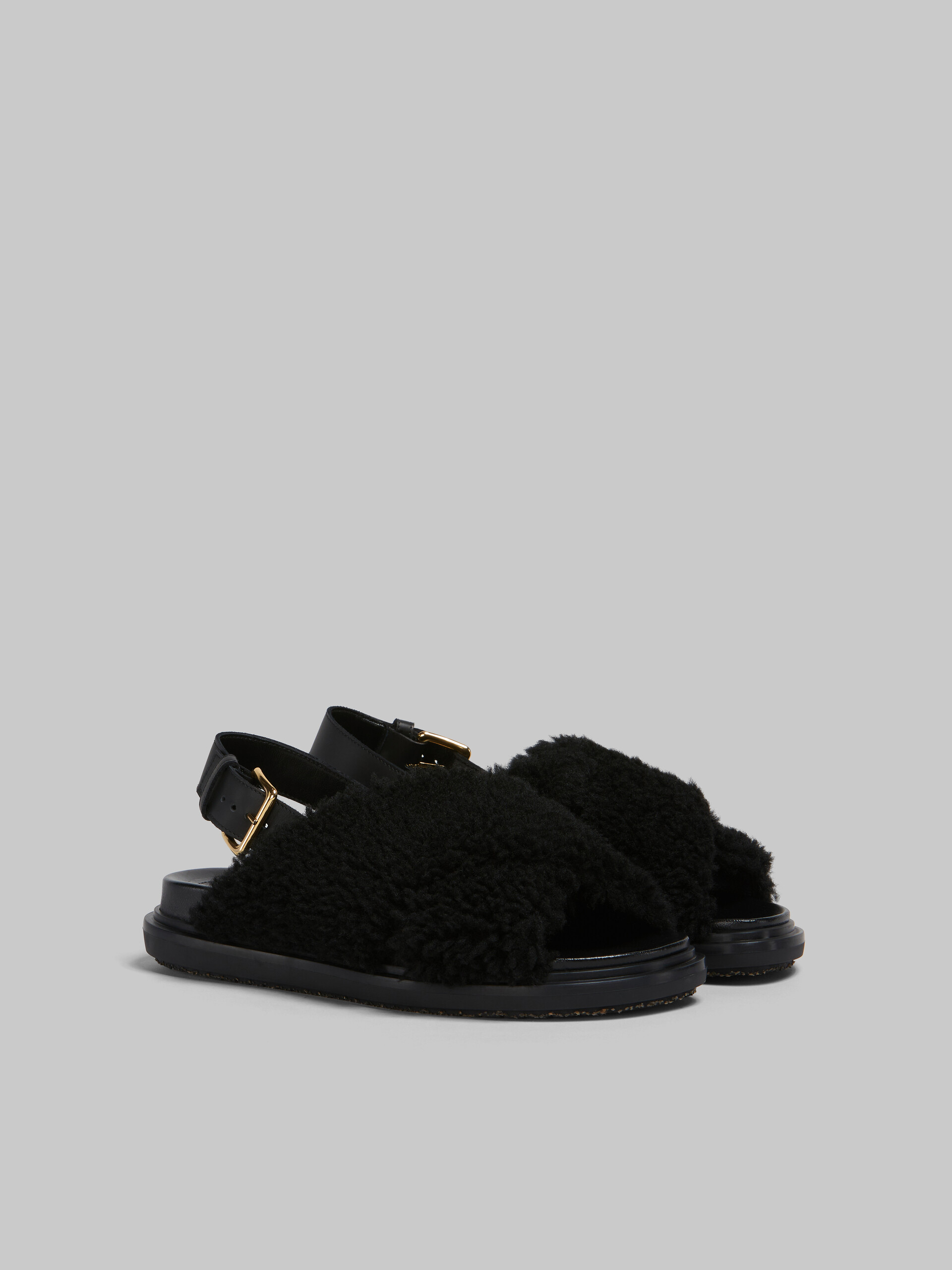 Schwarze Fußbett-Pantoletten aus gekräuseltem Shearling - Sandalen - Image 2